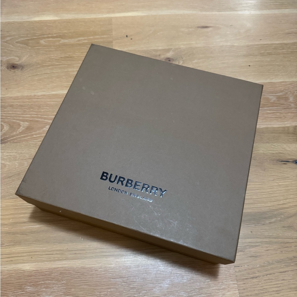 New in box Burberry rain boots with check lining